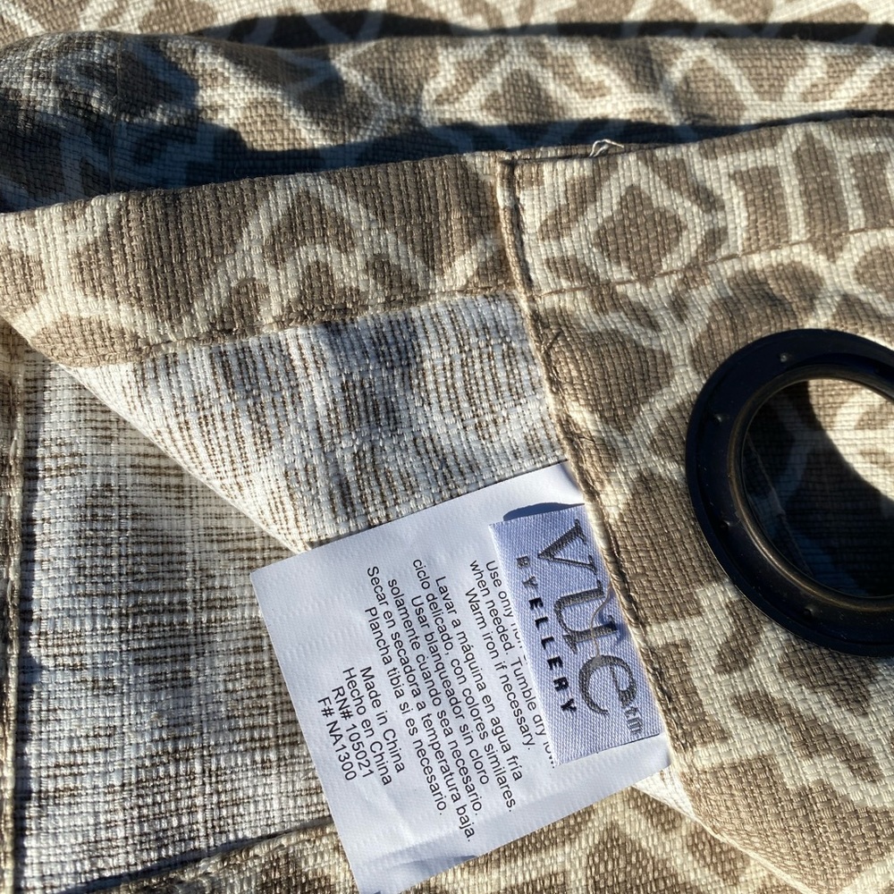 2-84” curtain panels and matching tan pillow